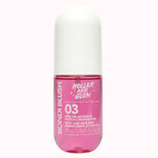 Pink bottle of Holler and Glow body and hair mist on a white background
